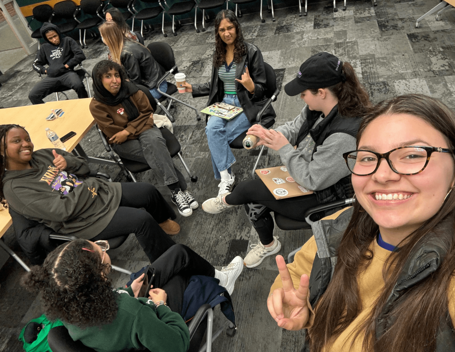 JMC student collaborating with Lansing students