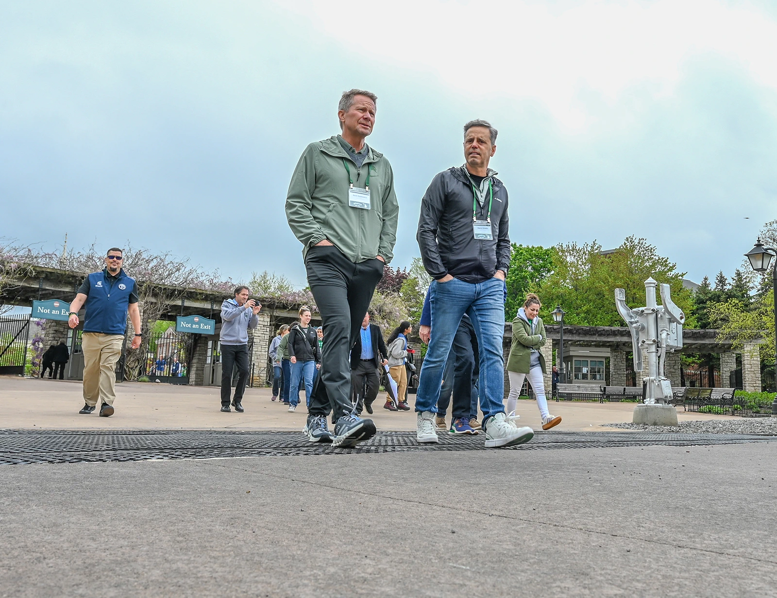 Two men walking.