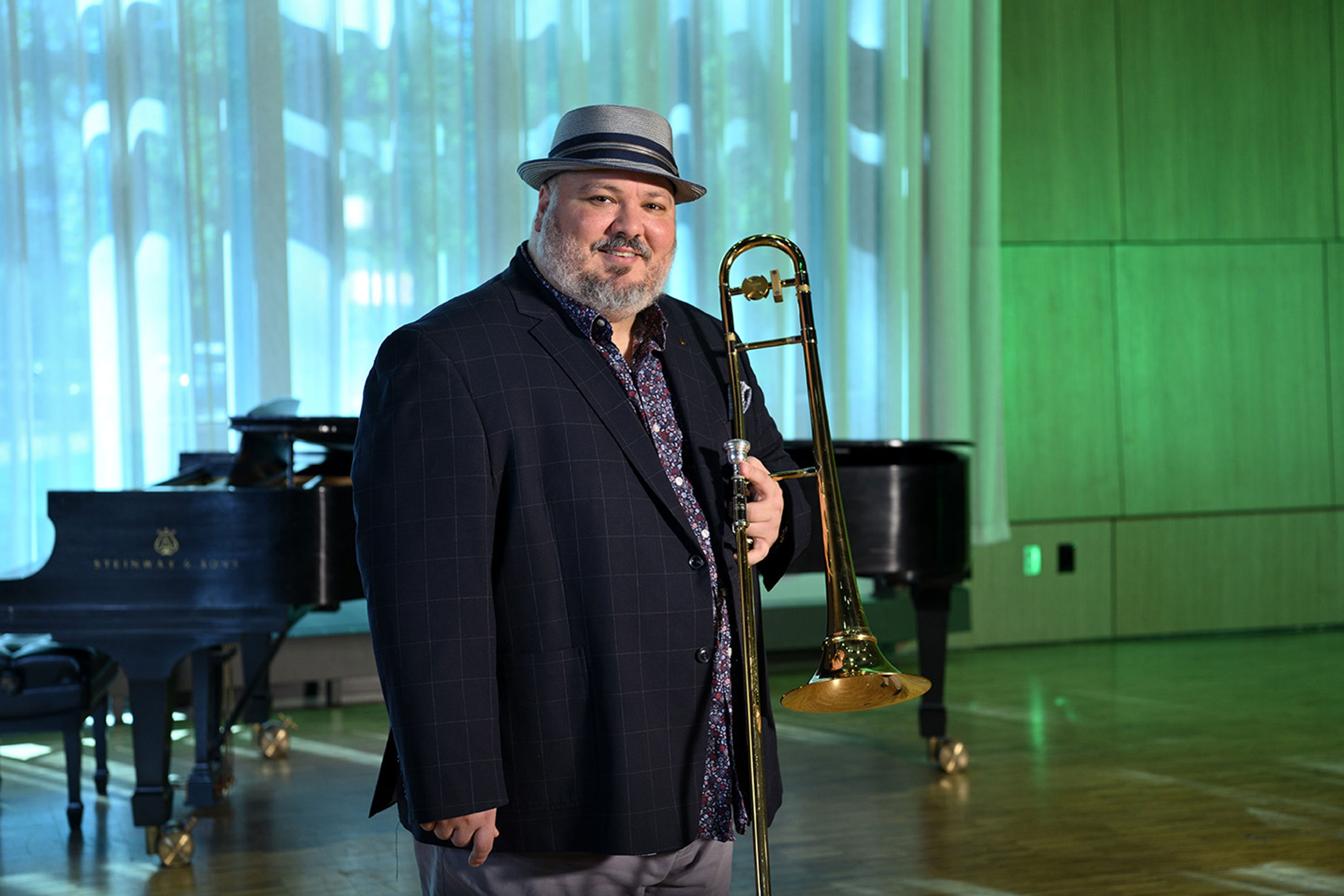 A man holding a trombone.
